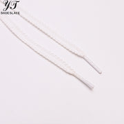 White lace-woven shoelaces