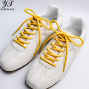 Yellow polyester round shoelaces (1 pair)