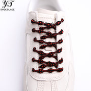 Purple polka dot slip-on shoelaces